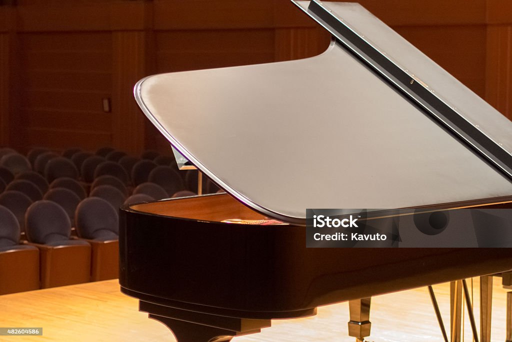 Piano wating for the opening of concert at wooden stage Classical Musician Stock Photo
