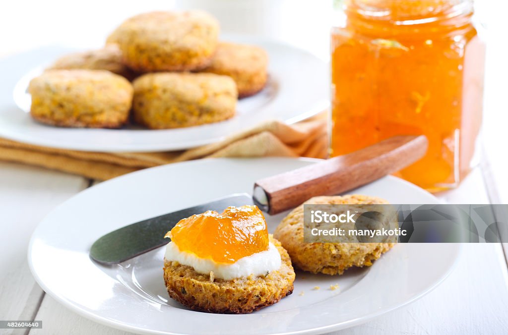 Carrot and rosemary scones Carrot and rosemary scones with cheese and marmalade 2015 Stock Photo