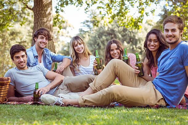 istock Happy friends in the park having picnic 482604872