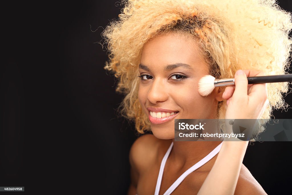 Makeup for Woman Make-up artist doing make up 2015 Stock Photo