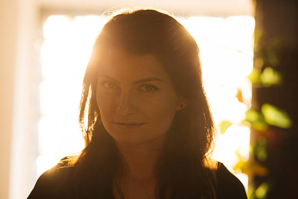 istock Enigmatic woman in sunset light 482605554