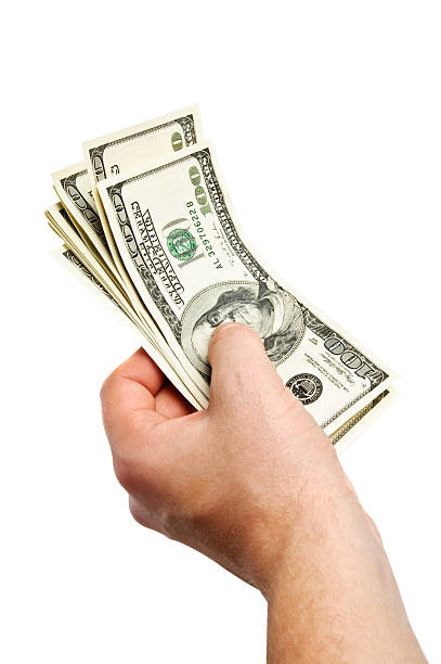 istock money in the hand 482606820