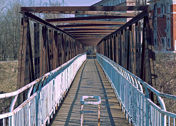 istock Old metal bridge over a ravine 482613333