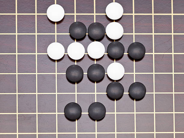 istock top view position of stones during go game 482613869