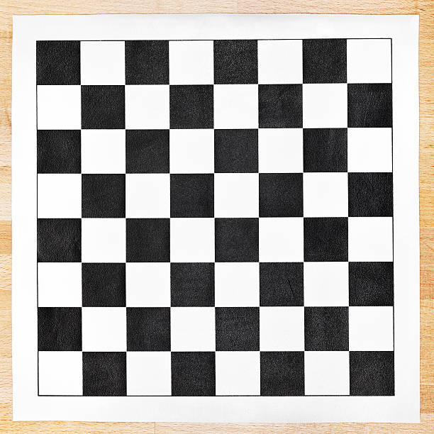 istock black and white vinyl checkerboard on wooden table 482614885