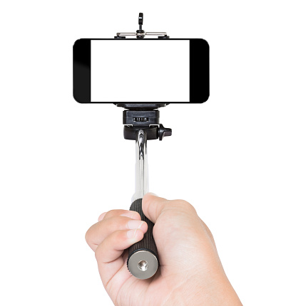 hand using selfie stick isolated white clipping path inside