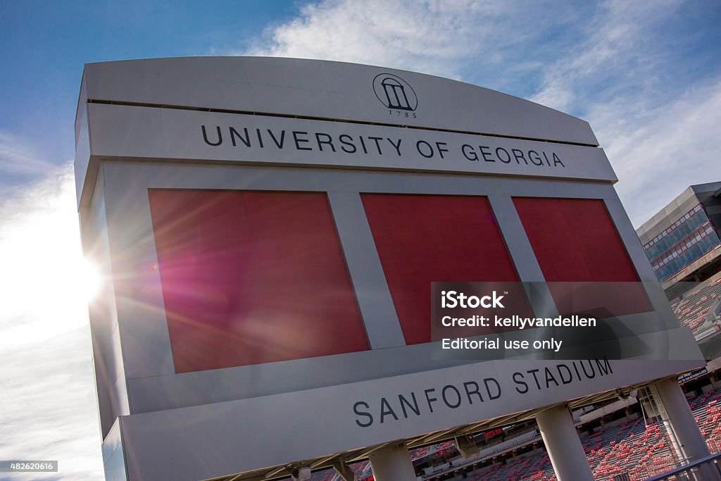 Sanford Stadium Sign Athens, United States - October 19, 2014: October 19, 2014. An early fall morning sees the sun rise over a beloved stadium in football country Athens - Georgia Stock Photo