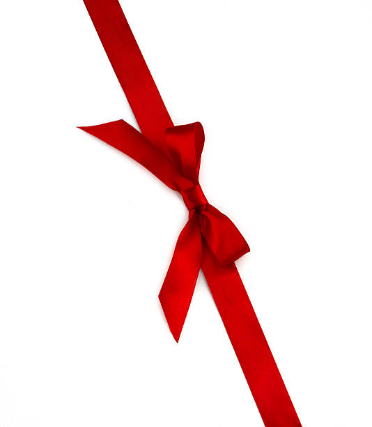 istock Red ribbon with bow isolated on white background 482625670