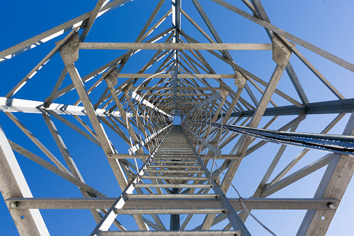 Ladders of a communication tower in the mountain designed to monitor with cameras and notify for fires.