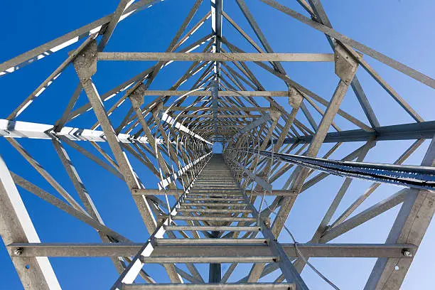 Photo of Ladder stairs of a communication tower.