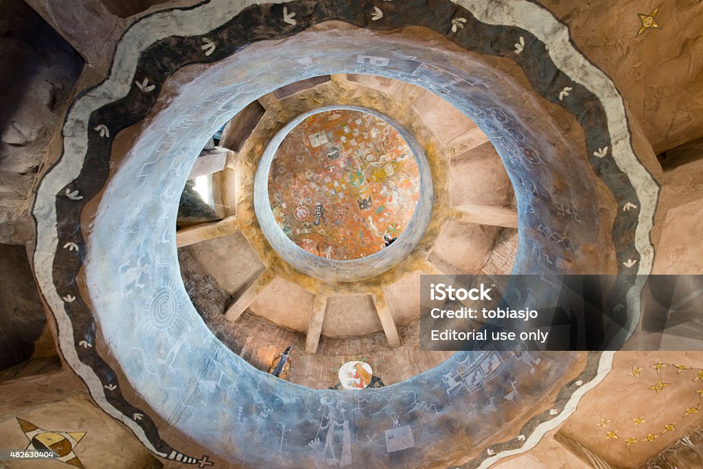 Historic Watchtower In Grand Canyon Grand Canyon, Arizona, USA - May 26, 2015: View from below and up inside the Desert View Watchtower, also known as the Indian Watchtower at Desert View, a 70-foot (21 m)-high stone building located on the South Rim of the Grand Canyon National Park. 2015 Stock Photo