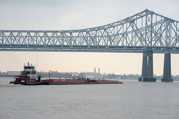 istock Barge and Crescent City Connection bridge in New Orleans Louisiana 482632607