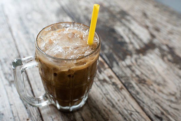 istock Iced Milk Coffee on Wooden Background 482633510