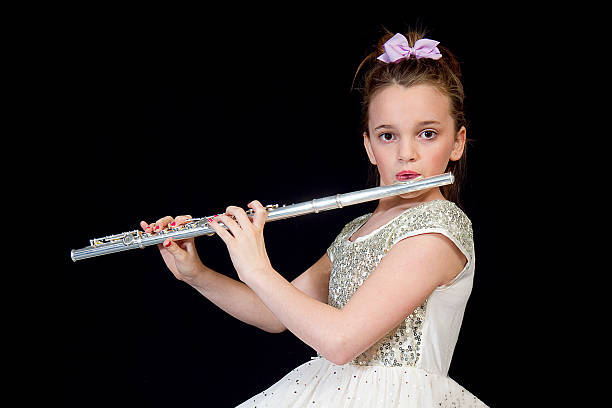 istock Girl Playing Her Flute 482634013