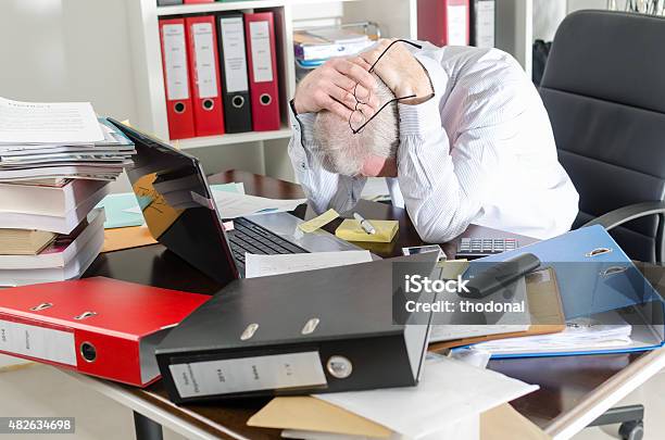 Stressed Businessman Stock Photo - Download Image Now - Messy, Office, Chaos
