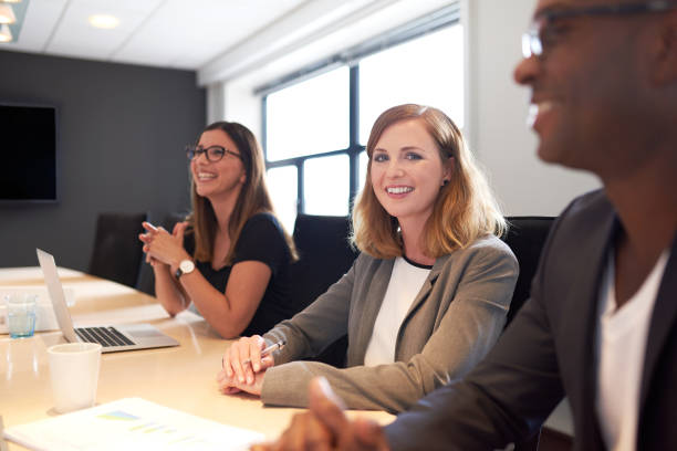 istock Young white female executive smiling at camera 482634970