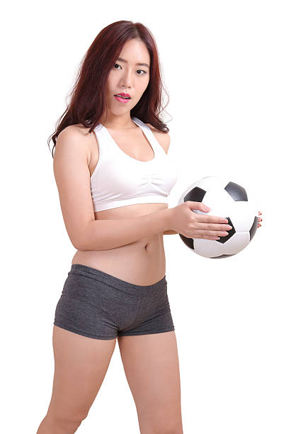 istock woman and football 482635366