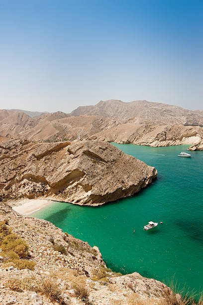 istock Turquoise Lagoon Oman Coast with hidden beautiful beach 482636725