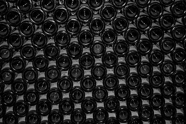 istock The bottom of wine bottles stacked in cellar 482643678