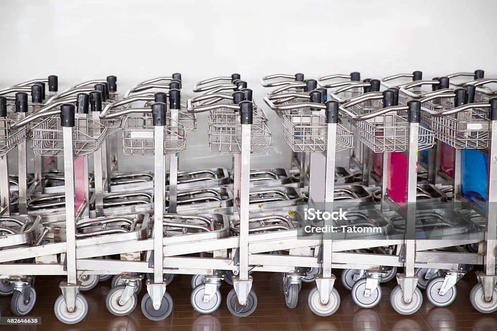 trolleys luggage in a row in airport 2015 Stock Photo