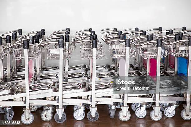 Trolleys Luggage In A Row In Airport Stock Photo - Download Image Now - 2015, Airplane, Airport
