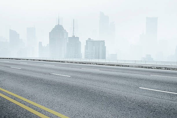 istock Asphalt road and modern city 482648291