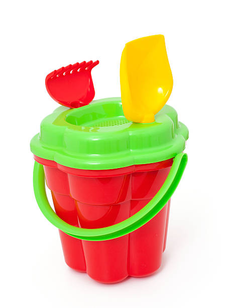 istock play set with bucket, shovel and rake on white 482649295