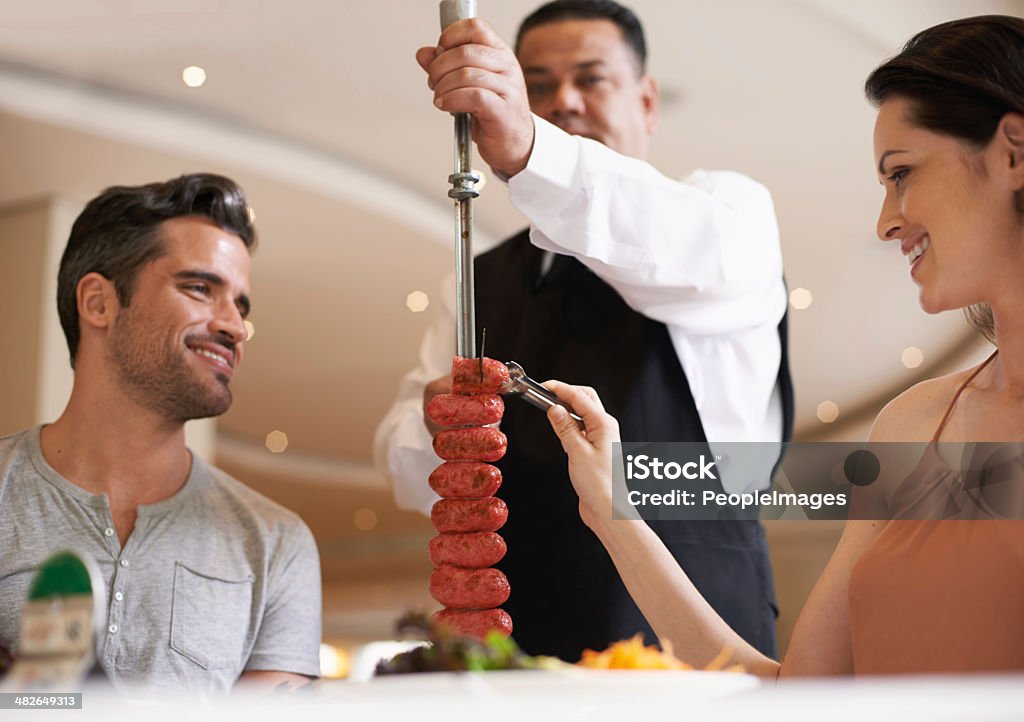 Treating his lady to a lovely lunch A happy couple having a meat dish at a fine dining restauranthttp://195.154.178.81/DATA/shoots/ic_783183.jpg Skewer Stock Photo