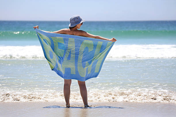 istock Woman enjoying the beach 482649581