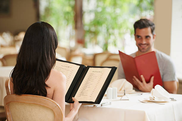 istock What are you going to order, honey? 482649789