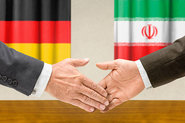 istock Representatives of Germany and Iran shake hands 482650678
