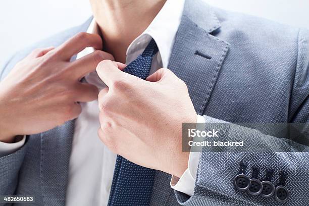 Businessman Stress Stock Photo - Download Image Now - Necktie, Tying, Too Small