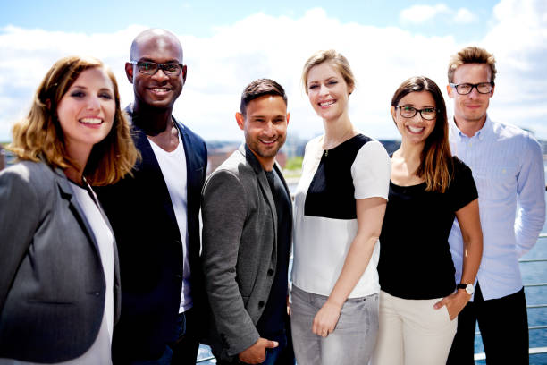 istock Group of executives posing outside for picture 482653928