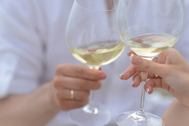 istock Man and woman with wine glasses 482658048