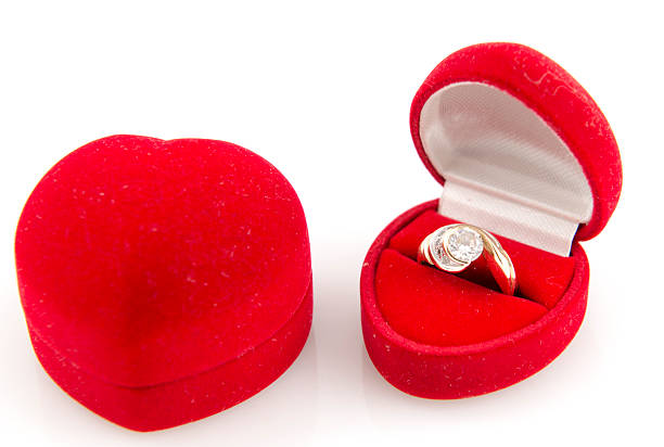 istock Golden ring in red heart box 482658557