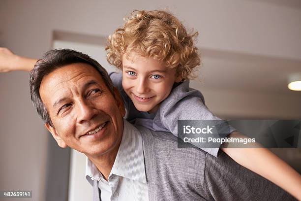 Grandchildren Are A Blessing Stock Photo - Download Image Now - Grandfather, Piggyback, Active Seniors