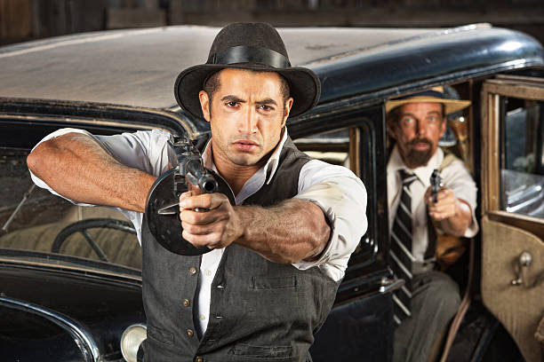 istock Tough 1920s Era Gangsters with Weapons 482660877