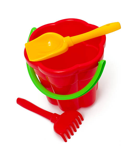 istock play set with bucket, shovel and rake on white 482661873