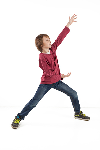 boy giving a thumbs up on white background
