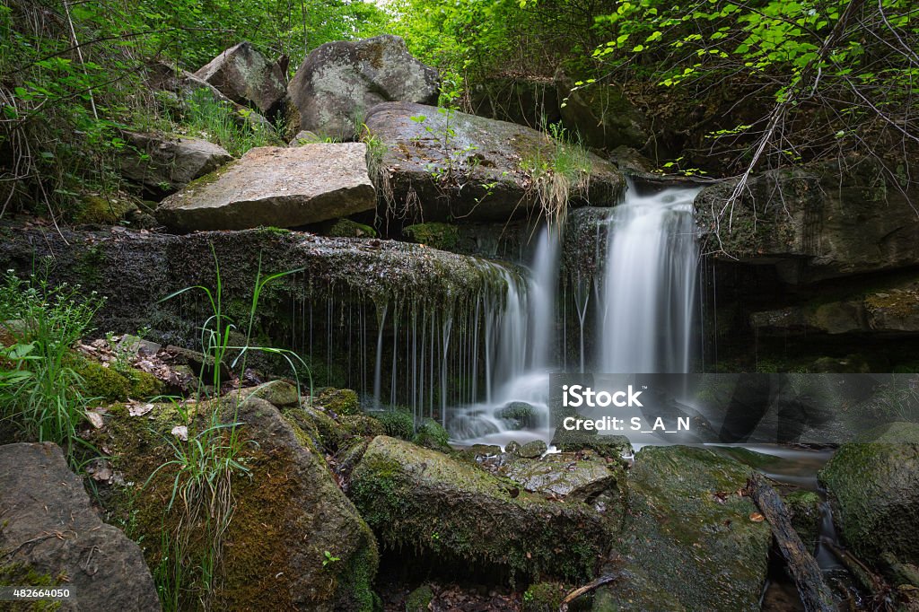Waterfall in forest Cascade waterfall in forest, Hesslacher WasserfÃ¤lle, Stuttgart, Germany 2015 Stock Photo