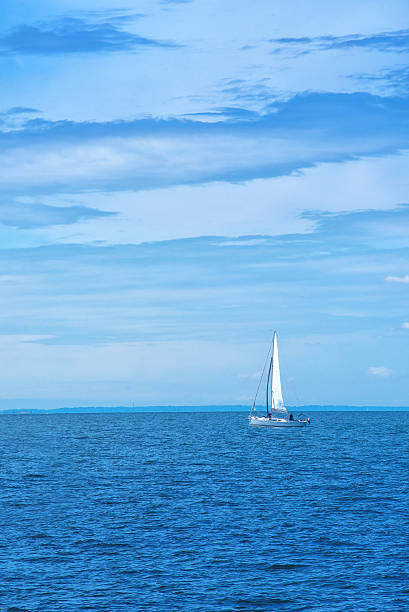 istock Boat Sailing at Blue Sea 482664088