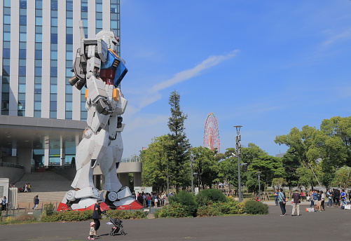 Tokyo Japan - May 22, 2015: People visit iconic Gundam statue in Odaiba Tokyo Japan.