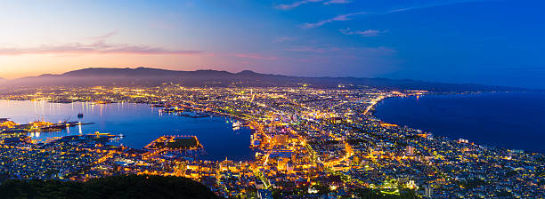 The city of Hakodate in the twilight, panorama The city of Hakodate in the twilight, panorama hakodate stock pictures, royalty-free photos & images