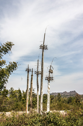 An animist ritual place in a Padaung (long neck) village near Loikaw, Myanmar. The place is used to put some of the harvest beneath the poles as a thanksgiving to the gods.