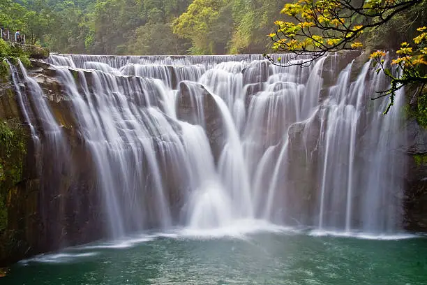 Shifen Waterfall is a scenic waterfall located in Pingxi District, New Taipei City, Taiwan, on the upper reaches of the Keelung River. The falls' total height is 20 metres (66 ft) and 40 metres (130 ft) in width, making it the broadest waterfall in Taiwan.