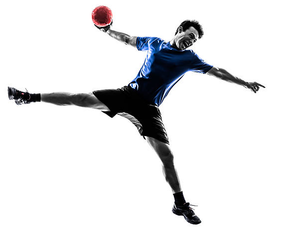 young man exercising handball player silhouette one caucasian young man exercising handball player in silhouette studio on white background team handball stock pictures, royalty-free photos & images
