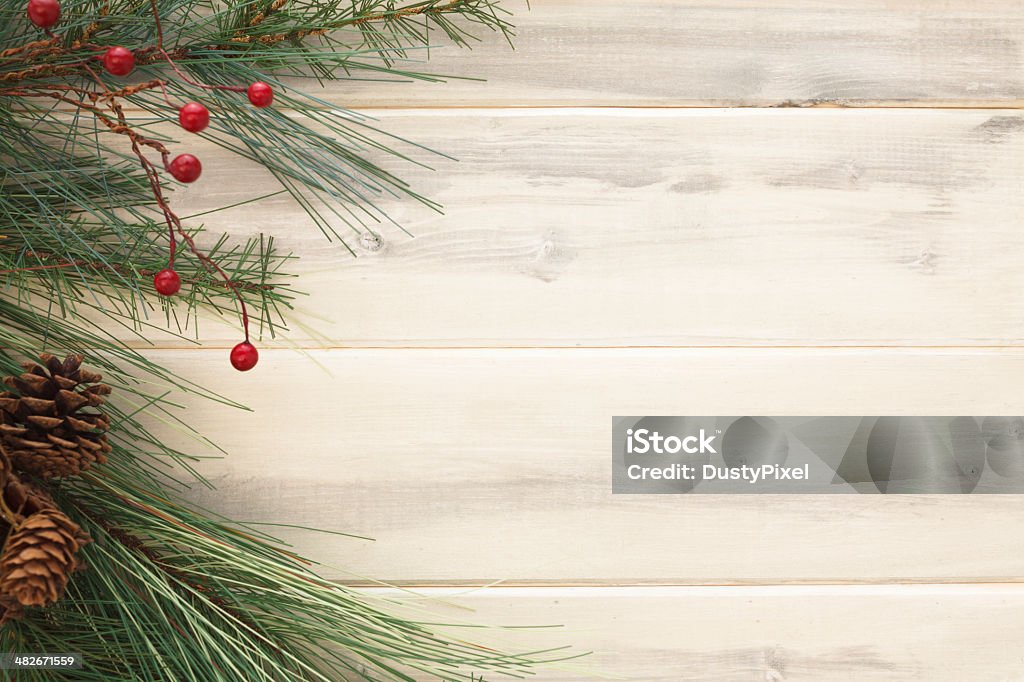 Rustic Christmas Christmas tree on rough sawn lumber sets the theme Backgrounds Stock Photo