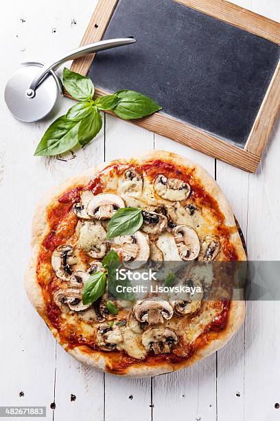 Pizza With Mushrooms Stock Photo - Download Image Now - Edible Mushroom, Pizza, Backgrounds