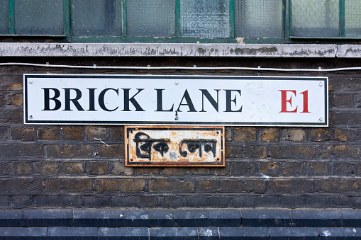 street sign for brick lane in london