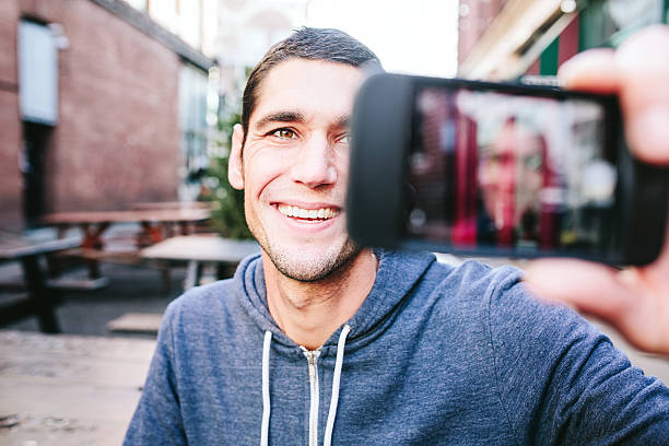 istock Man Taking a Selfie on Smart Phone 482673199